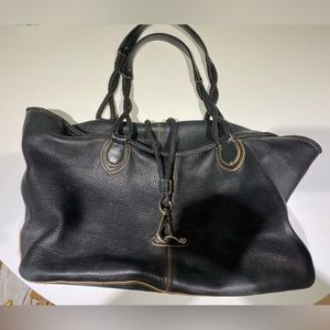 Cole Haan leather tote with waterproof lining.  Includes dust bag